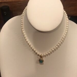 Amazing pearl necklace w/ tourmaline enhancer